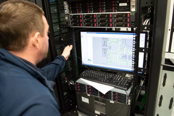 GBBSM Mobile Maintenance Engineer, Danny Jennings checking the BMS at Peel Hunt, 100 Liverpool Street.